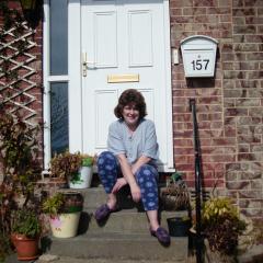 Janet on doorstep